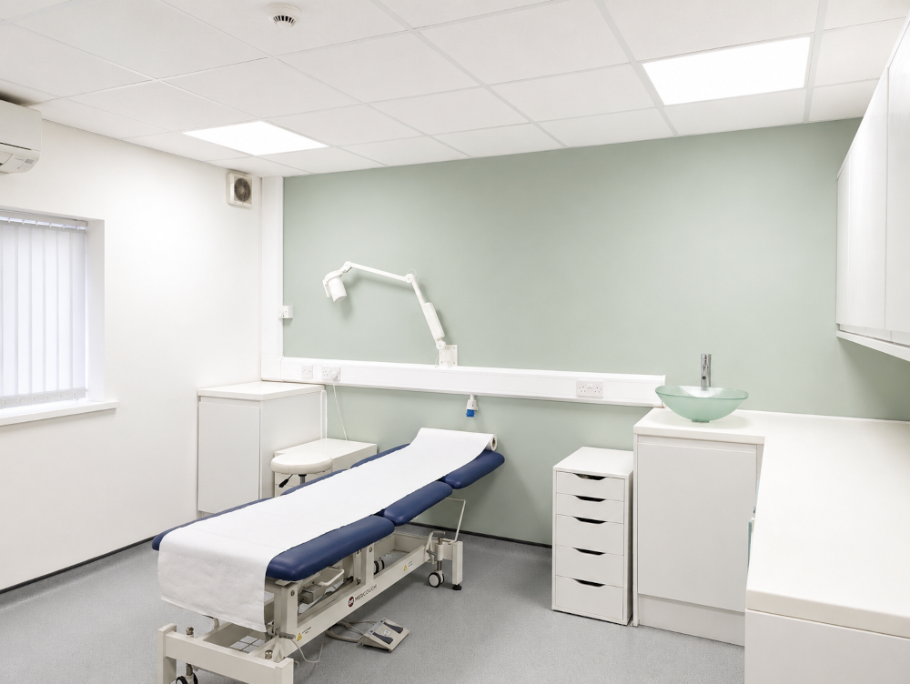 Clinic Room One - Patient table with Inspection Lamp
